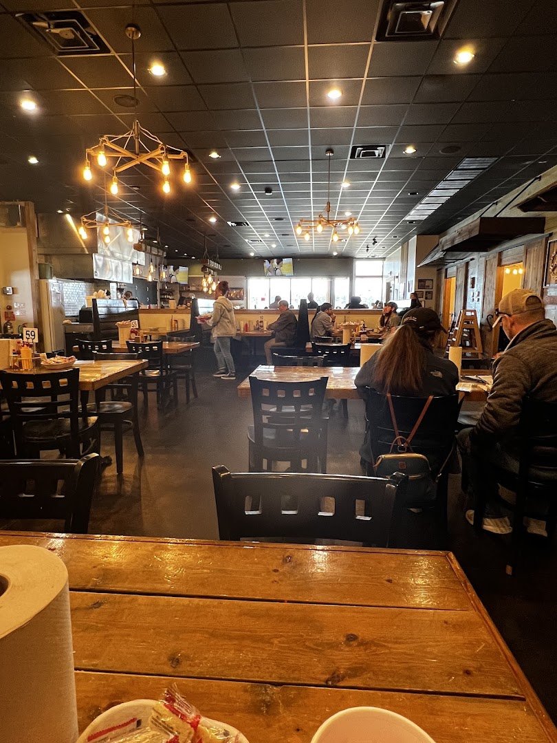 Crawfish and oyster bar with casual tables.